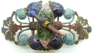 A Russian gilt buckle with knife fastener set with enamel