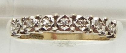 A 9ct gold ring set with diamonds, 2.1g, size M