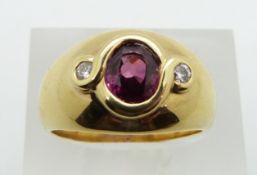 COLLECTING  A 14ct gold ring set with an oval cut ruby measuring approximately 1.1ct and two further