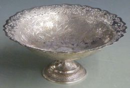 Indian or similar pierced tazza with hammered floral decoration