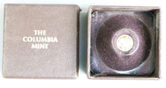 1980 miniature gold coin, sovereign design Colombia Mint. 0.4g, cased