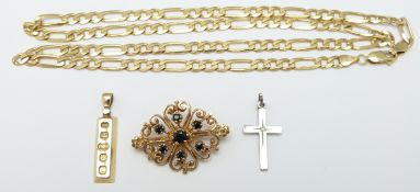 A 9ct gold necklace, 9ct gold ingot, white metal cross and a 9ct gold brooch set with sapphires,