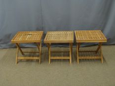 Three folding duckboard topped tables, W50 x D50 x H47cm