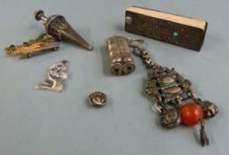 Novelty white metal pendant formed as a male torso marked sterling, hanging scent bottle, further