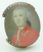 An early Victorian clasp set with a portrait miniature of a gentleman, 3 x 3.5cm