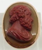 A 9ct gold ring set with an agate cameo, signed verso,13.3g, size O