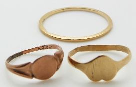 Two 9ct gold signet rings and a 9ct gold ring, 1.8g