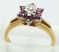 COLLECTING  A 9ct gold ring set with diamond and pink sapphires, 3.2g, size N