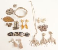 A filigree bangle, filigree brooches, a pair of gilt filigree earrings, niello bracelet etc