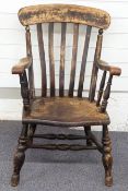 A 19thC elm seated Windsor chair, 92cm high