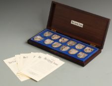 'The Royal Arms', cased set of 12 hallmarked silver shield shaped Coats of Arms, weight 581g