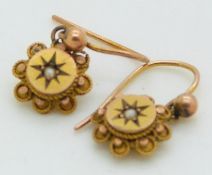 A pair of 9ct gold Victorian earrings set with a seed pearl to each