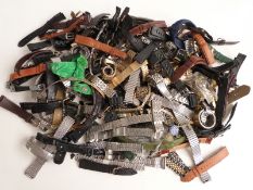 A large collection of wristwatch straps and bracelets including leather examples.