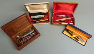 A collection of pens including Waterman