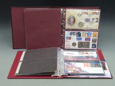 Philatelic numismatic covers in two albums covering various commemorative events to include