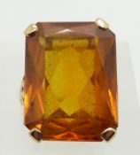A 9ct gold dress ring set with a large citrine, 8.5g, size N