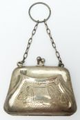 A hallmarked silver purse  with engraved decoration, Birmingham 1918