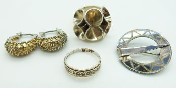 Two silver rings, silver earrings and Scottish silver brooch