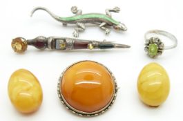 An amber brooch, amber earrings, silver brooch set with citrine and agate, a silver lizard brooch