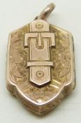 Victorian buckle locket with engraved decoration, 1.5 x 2cm