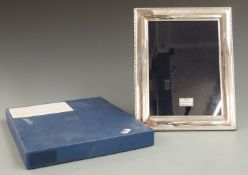 Hallmarked silver photograph frame to suit 8 x 6 inch photo, with wooden easel back, Sheffield