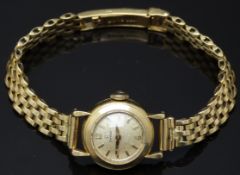 COLLECTING Omega 18ct gold ladies wristwatch ref. 10774 with gold hands and hour markers,