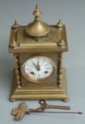French brass cased two train mantel clock with enamel painted dial, 29cm tall