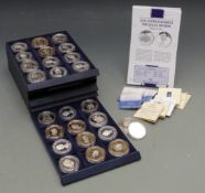 Twenty six silver crown sized Royal commemorative coins in a collector's tray, some with