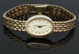 Rotary 9ct gold ladies wristwatch ref. W139-187 with gold hands and baton markers, champagne dial