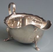 George V hallmarked silver sauce boat raised on three feet, Sheffield 1933 maker Viners Ltd,