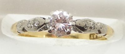 An 18ct gold ring set with a diamond of approximately 0.35ct in a platinum setting, 1.9g, size J