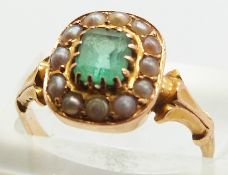 Victorian ring set with an emerald cut emerald surrounded by seed pearls, 3.2g, size M
