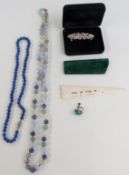 Single strand of lapis lazuli beads, a strand of agate beads and a bone and malachite paper knife