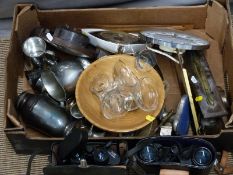 Plated cocktail shaker, treen bowl, trench art, three retro Metamec clocks, two pairs of binoculars,