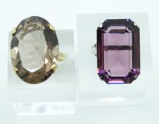 A 9ct gold ring set with paste (size M) and a silver ring set with amethyst (size N)