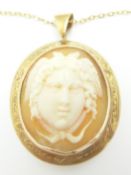 A Victorian yellow metal pendant set with a cameo on a 9ct gold chain (Chain- 7g)