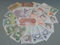 A small collection album of largely UK banknotes, includes mauve Peppiatt