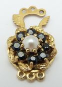 A 9ct gold clasp set with a pearl and sapphires