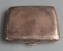 Hallmarked silver engine turned cigarette case, weight 77g