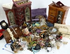 A collection of costume jewellery including beads, brooches etc