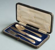 Cased hallmarked silver christening set comprising spoon, knife and fork, Sheffield 1921 and 1928