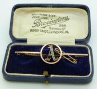 Victorian 9ct gold brooch set with diamonds in a letter 'A', in Bravingtons box, 3.1g
