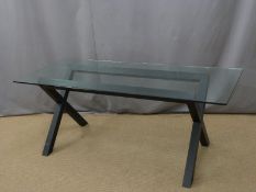 Modern glass topped table with black X frame support L180 x W80 x H73cm