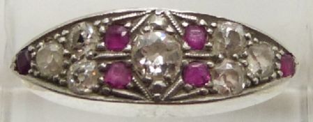 Art Deco 18ct gold ring set with seven old cut diamonds, the centre diamond measuring