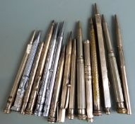 Fifteen white metal and silver plated pencils, some with hardstone finials.
