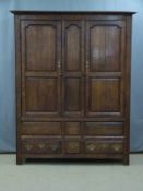 Antique oak panelled wardrobe with three drawer below, W148 x D54 x H196cm