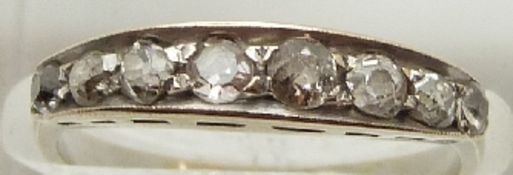 An 18ct white gold ring set with eight diamonds, 2.3g, size N