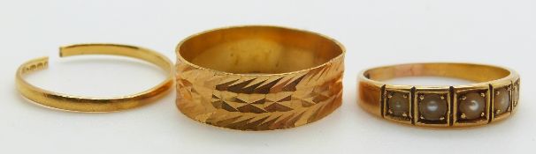 An 18ct gold ring set with pearls by B & H (3.1g), 22ct gold ring (1.5g) and a yellow metal ring (