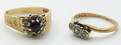 A 9ct gold ring set with a sapphire and diamonds and a 9ct gold ring set with paste, 5.0g
