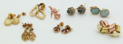 A pair of 9ct gold knot earrings, 9ct gold earrings set with opals, 9ct gold earrings set with